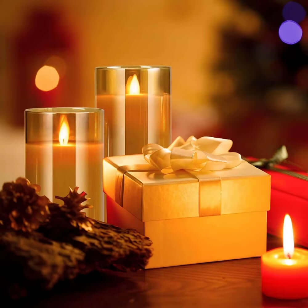 LED electronic candles with warm light beside a gift box, creating a cozy holiday atmosphere.