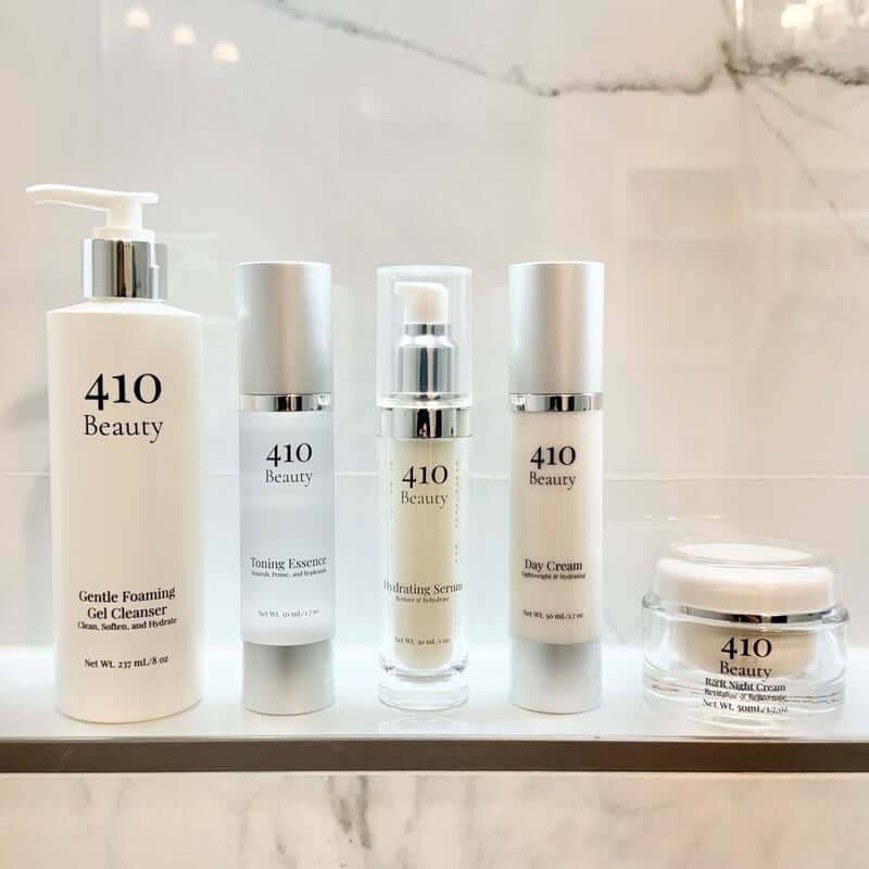 410 Beauty Essentials Bundle- Includes a 237Ml Bottle of Our Gentle Foaming Gel Cleanser, a 50Ml Bottle of Our Toning Essence, a 30Ml Bottle of Our Hydrating Serum, a 50Ml Bottle of Our Day Cream, and a 50Ml Jar of Our R&R Night Cream