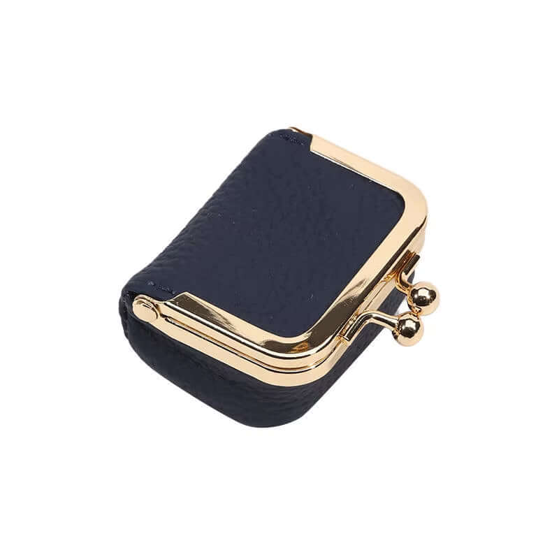 Navy blue PU leather kiss lock mini wallet with gold hardware for jewelry storage.
