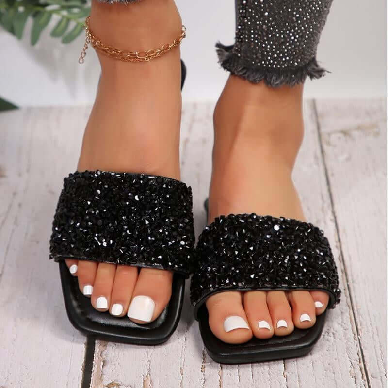 Chic rhinestone black slippers with open toe design, perfect for summer beach wear and casual outings.