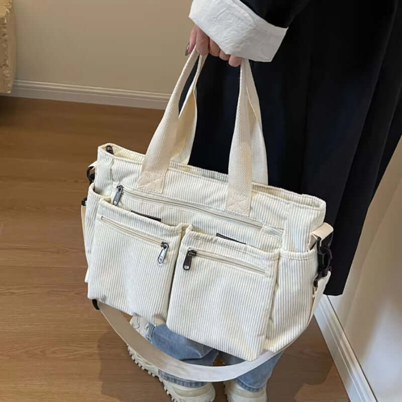 Large capacity corduroy tote bag in white, perfect for commuters and fashion-forward women.